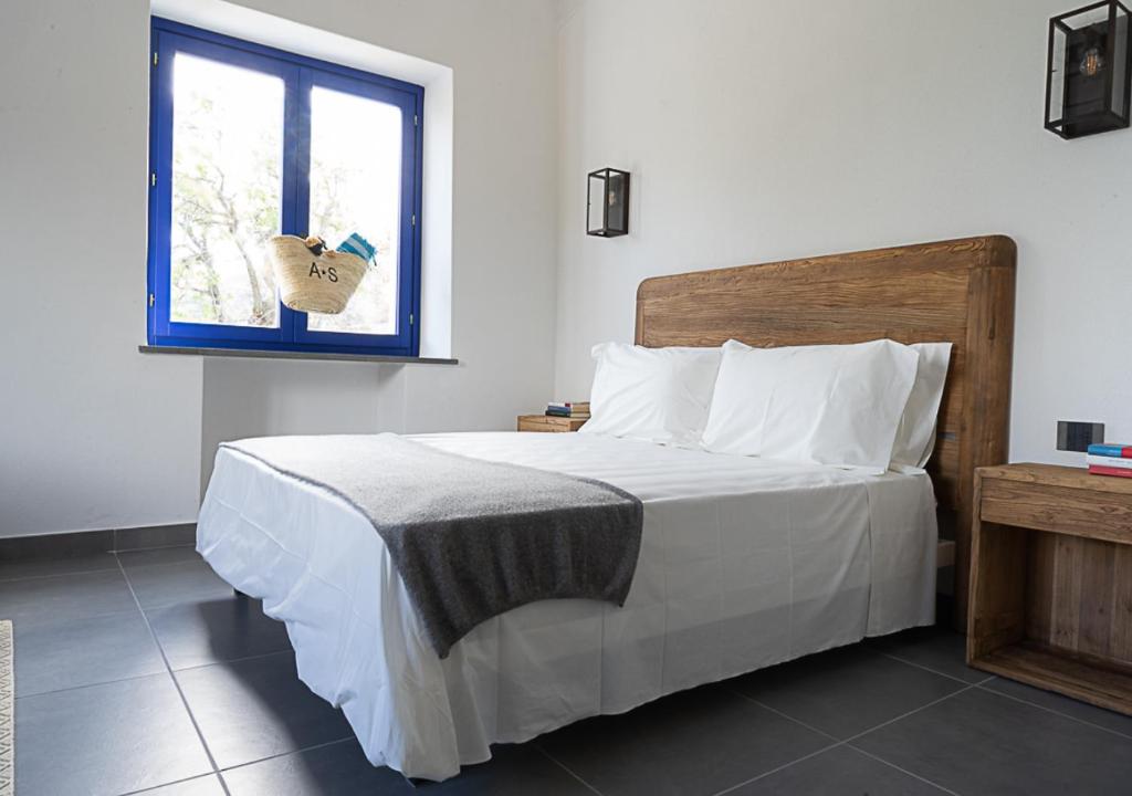 Postel nebo postele na pokoji v ubytování Albergo Rurale Casa Fois