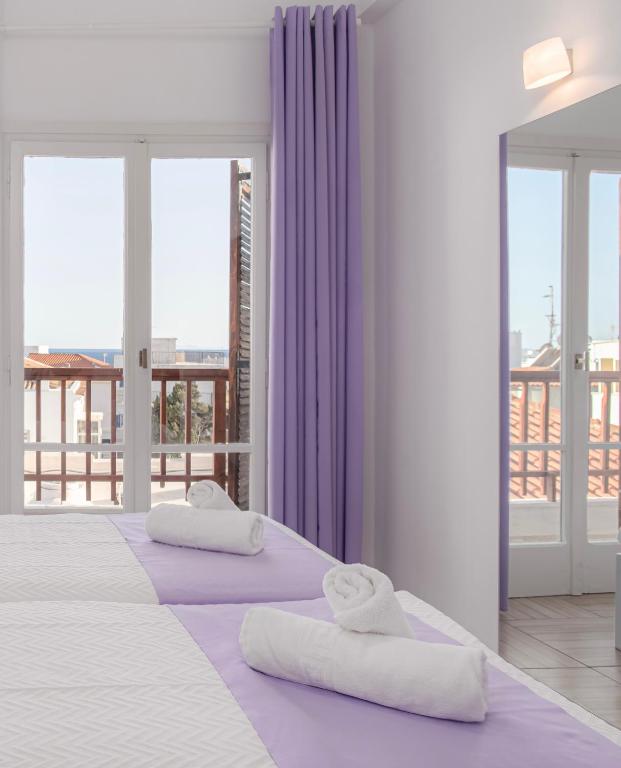 Postel nebo postele na pokoji v ubytování Venus Minimal Hotel