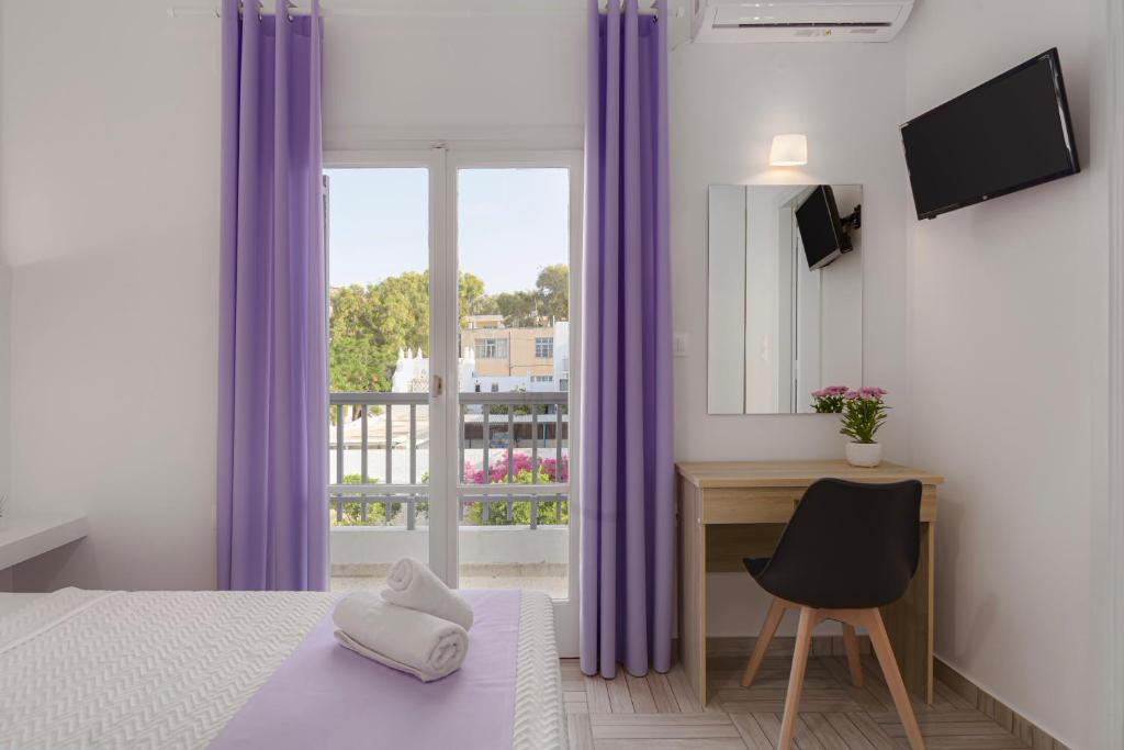Postel nebo postele na pokoji v ubytování Venus Minimal Hotel
