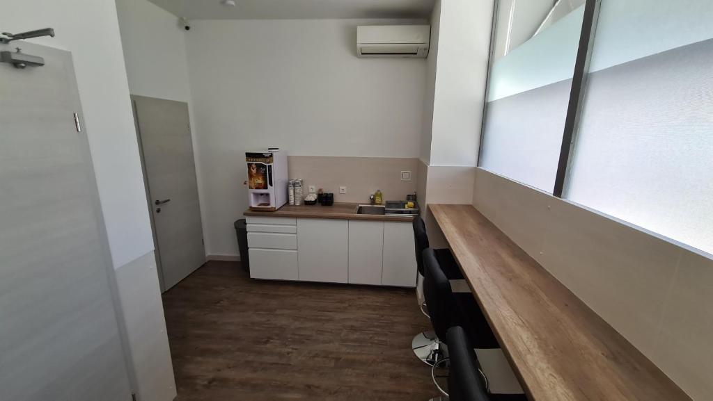 Kuchyň nebo kuchyňský kout v ubytování Cabin HOSTEL