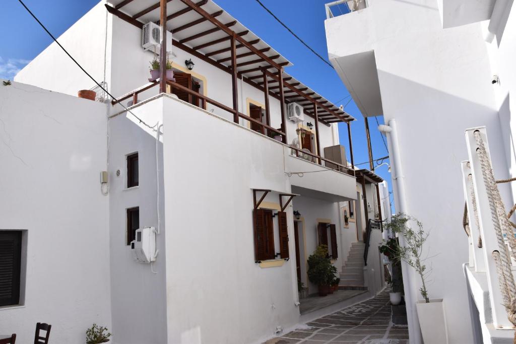 a view of the side of a white building at Naoussa Center Cycladic House in Kampos Paros