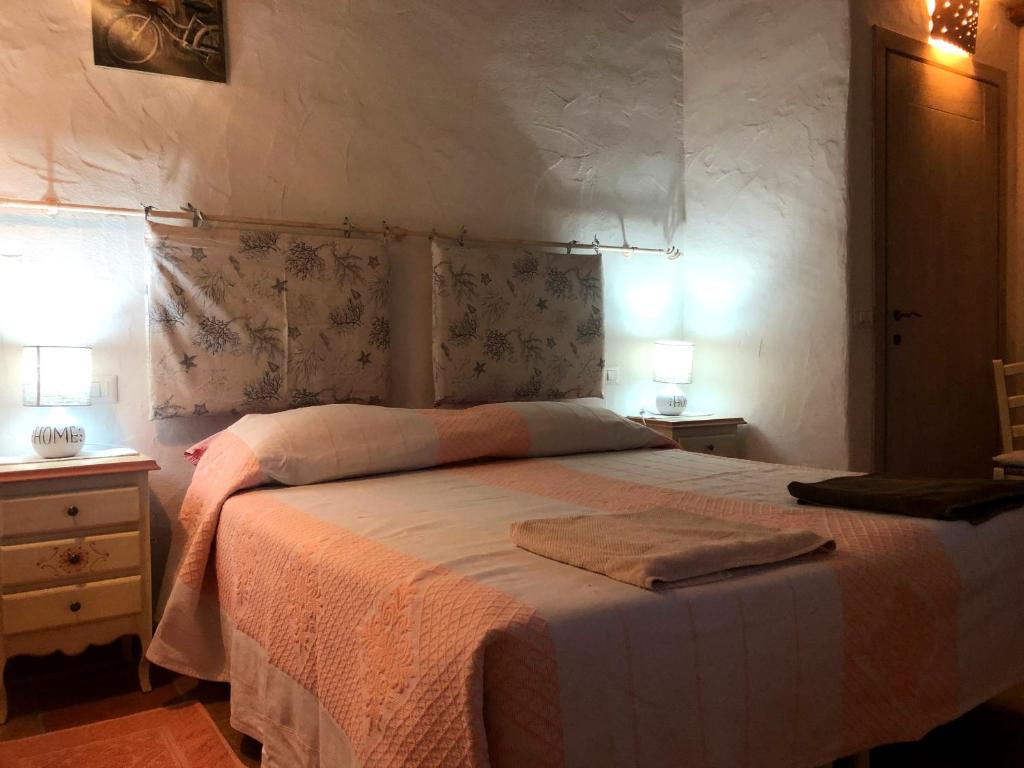 Voodi või voodid majutusasutuse Agriturismo Fioredda toas