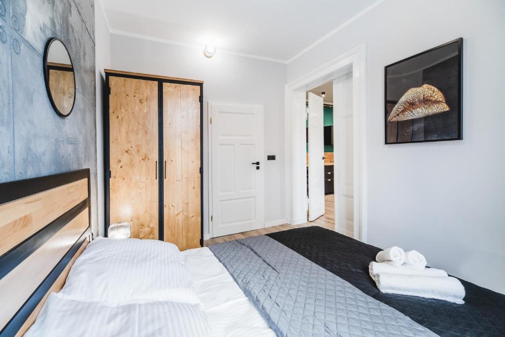 Posteľ alebo postele v izbe v ubytovaní Modern Apartments Toruń 3 Stare Miasto-Centrum