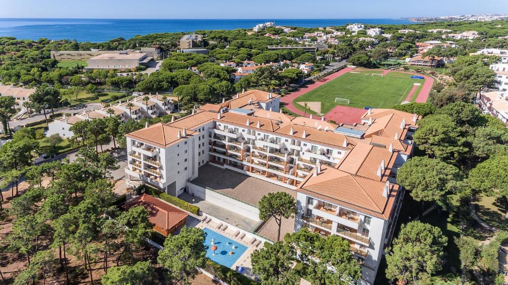 an aerial view of a building with a resort at AP Victoria Sports & Beach in Albufeira