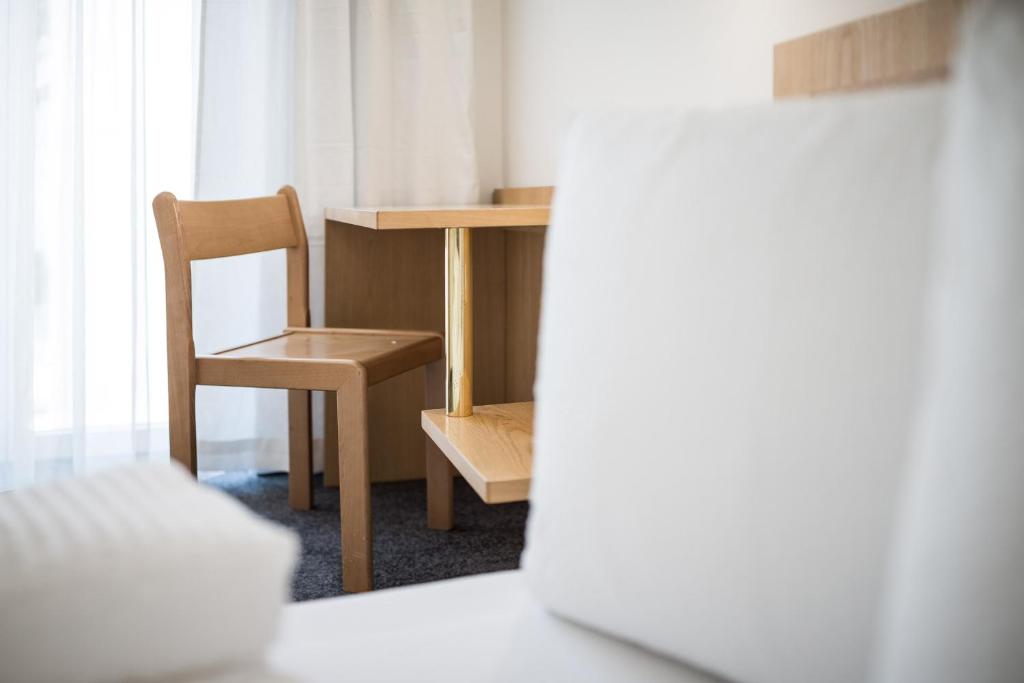 Postel nebo postele na pokoji v ubytování Mondschein Rooms