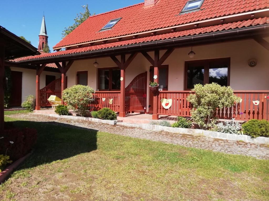 Vonkajšia záhrada v ubytovaní Apartamenty Kołczewo