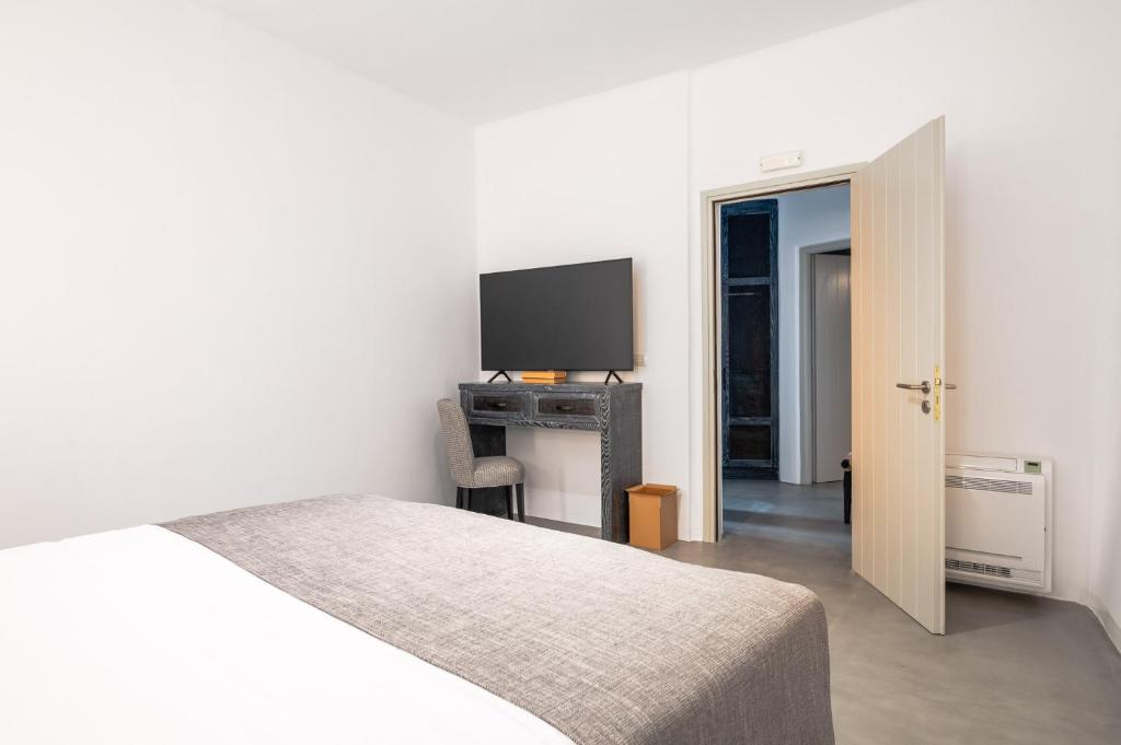 Postel nebo postele na pokoji v ubytování Deep Earth Villas