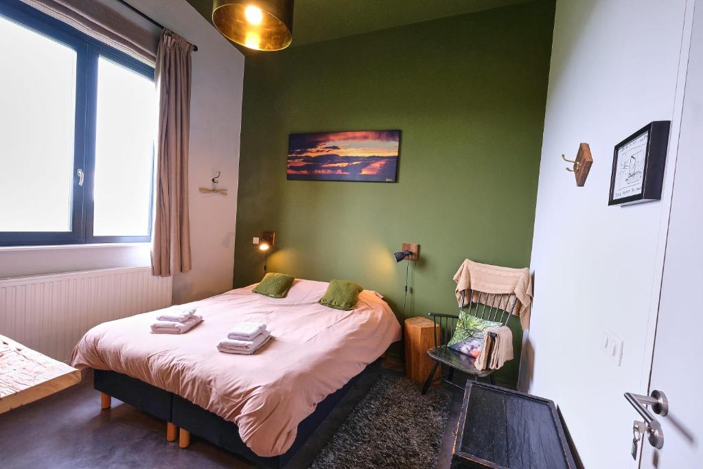 Postel nebo postele na pokoji v ubytování Maison d'Hôtes Cerf'titude