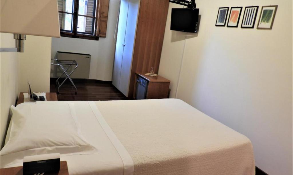 Postel nebo postele na pokoji v ubytování Deco Hotel
