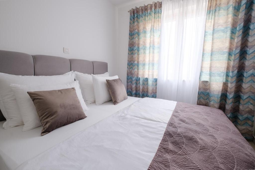 Posteľ alebo postele v izbe v ubytovaní MB Luxury Apartments