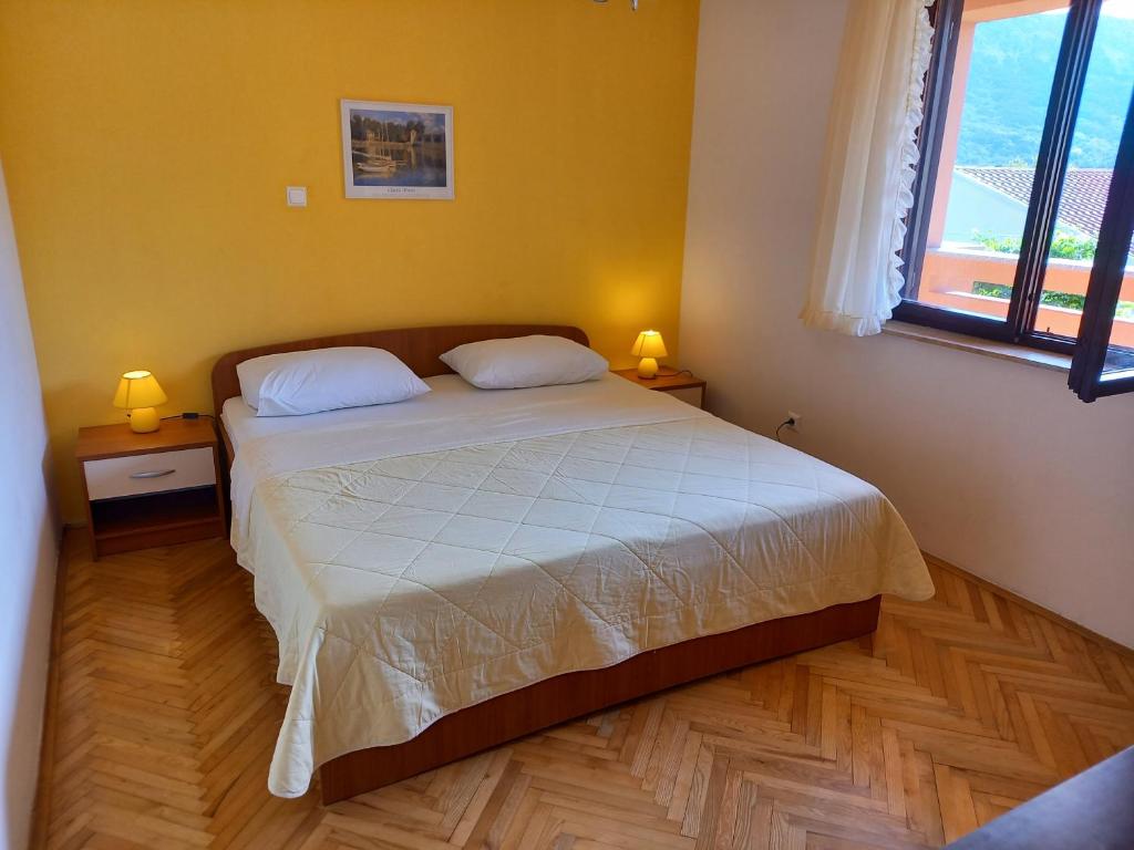 Posteľ alebo postele v izbe v ubytovaní Apartments Mirjana Baška