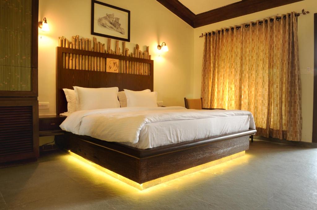 Letto o letti in una camera di Asiatic Lion Lodge
