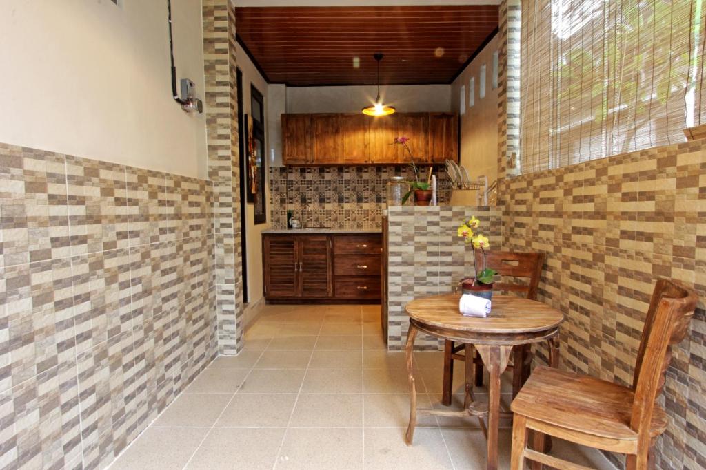 Kuchyň nebo kuchyňský kout v ubytování Sari House Ubud - Balinese Style Homestay