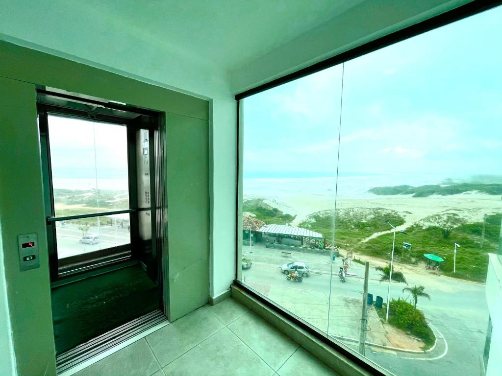 APARTAMENTO BEIRA MAR PRAIA GRANDE ATÉ 7 pessoas