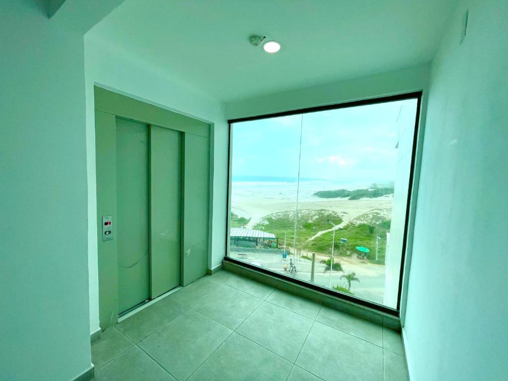  APARTAMENTO BEIRA MAR PRAIA GRANDE ATÉ 7 pessoas