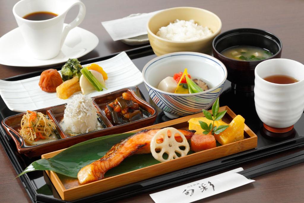 a tray of food with a variety of foods on it at Shibuya Excel Hotel Tokyu in Tokyo