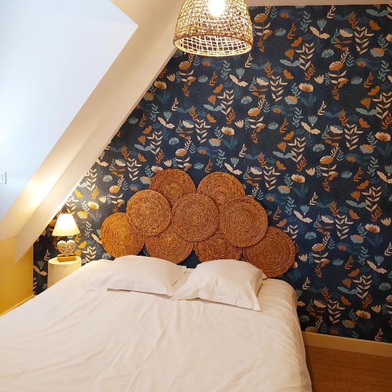 Кровать или кровати в номере Gites et Spa - Manoir des Falaises