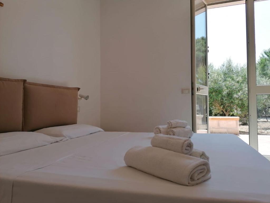 Postel nebo postele na pokoji v ubytování VILLA CIELO MARE