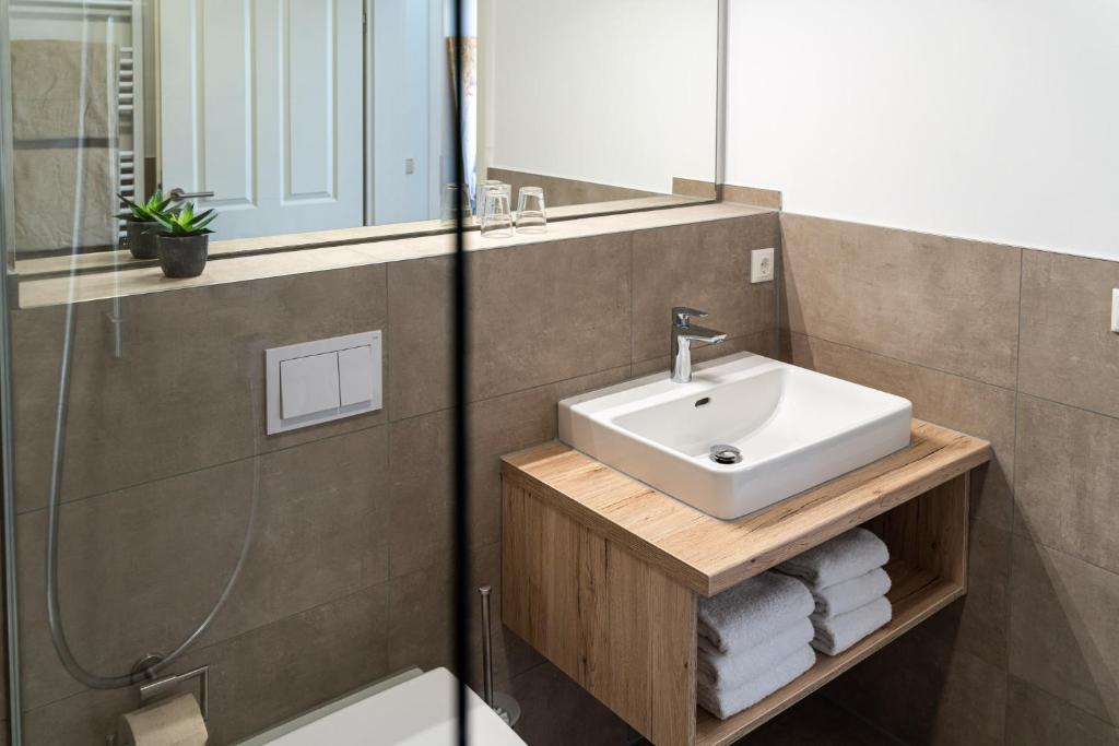 Koupelna v ubytování Strandhafer Aparthotel