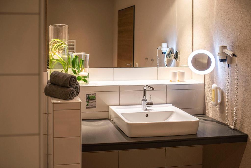Koupelna v ubytování Müller´s Landhotel