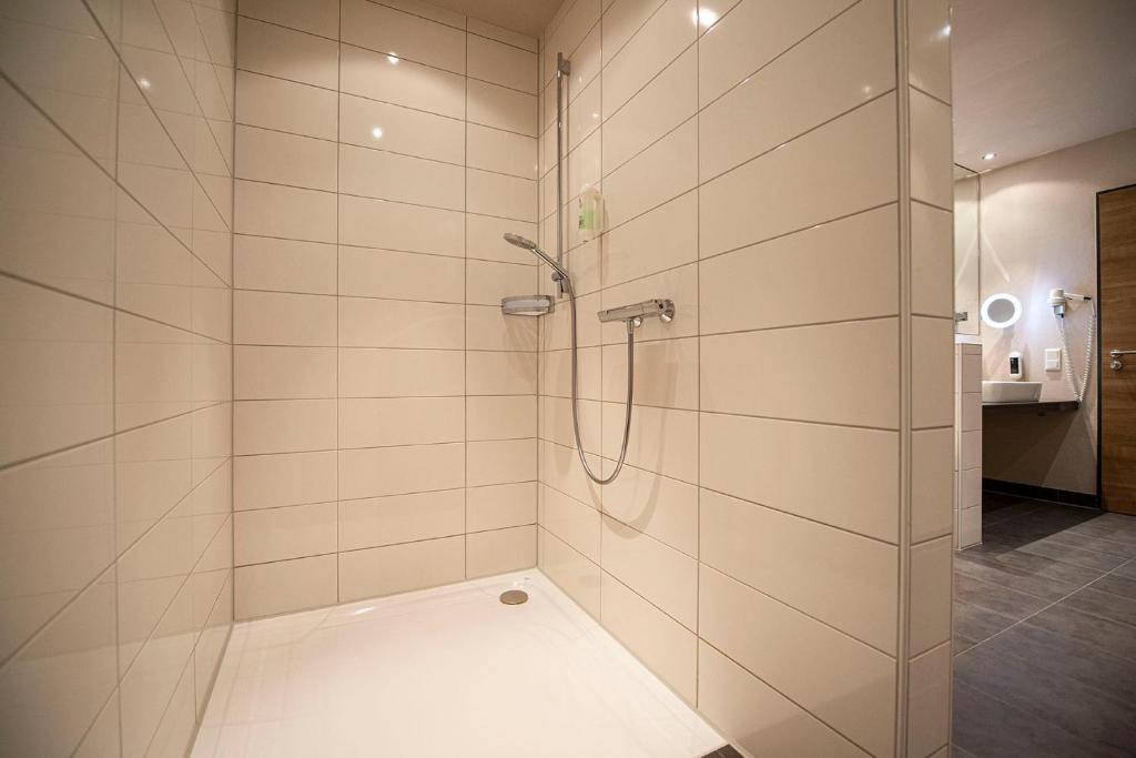 Koupelna v ubytování Müller´s Landhotel