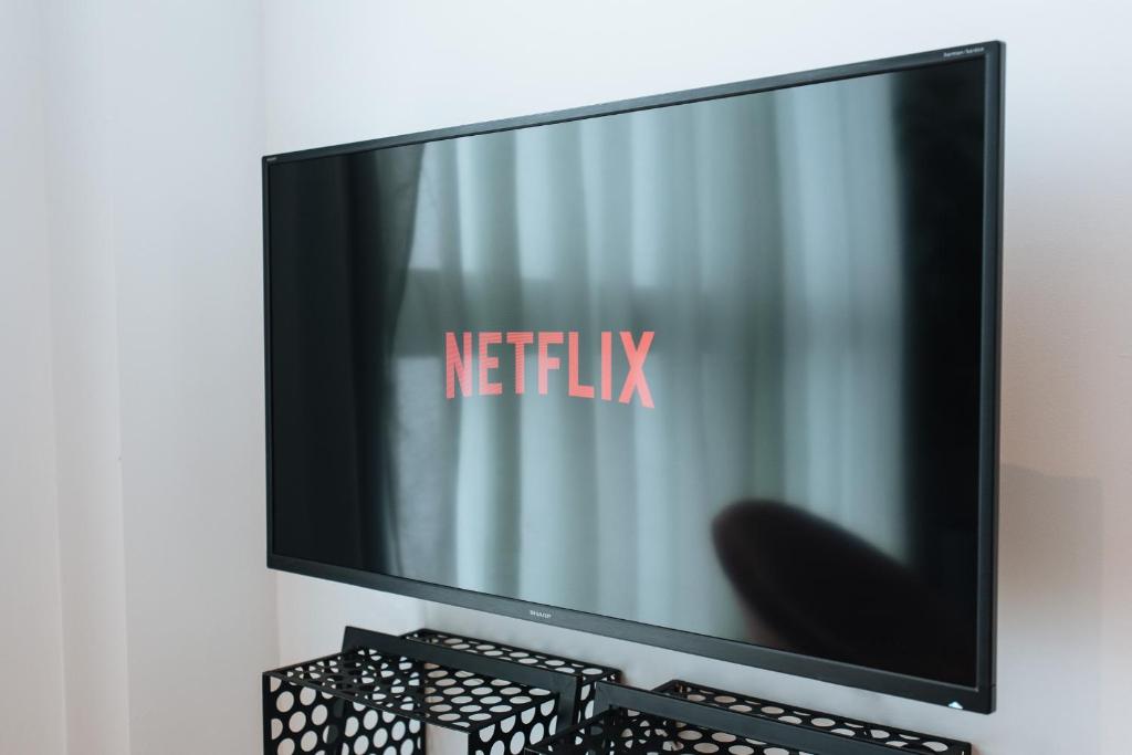 TV a/nebo společenská místnost v ubytování Alameda 1851 - Shared jacuzzi