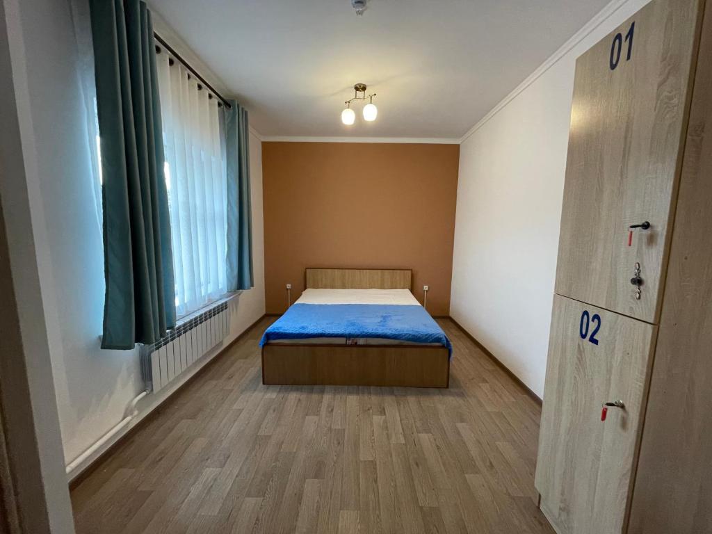 Postel nebo postele na pokoji v ubytování KbH-Karakol based Hostel