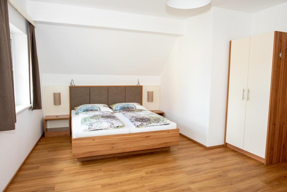 Voodi või voodid majutusasutuse Gästehaus Schütz toas