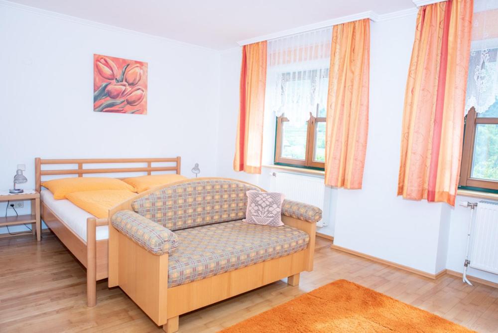 Voodi või voodid majutusasutuse Gästehaus Schütz toas