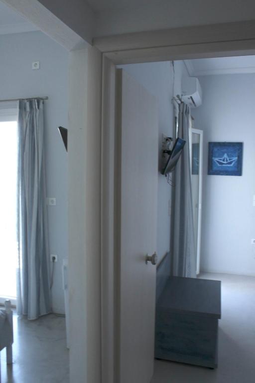 Telewizja i/lub zestaw kina domowego w obiekcie Passos Rooms