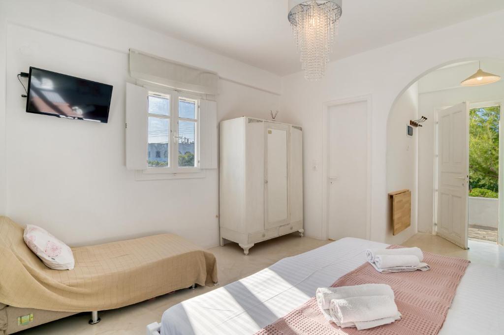 Posteľ alebo postele v izbe v ubytovaní Dahlia Apartments And Studios