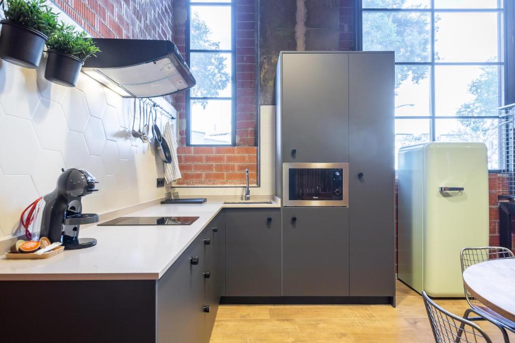 Kuchyň nebo kuchyňský kout v ubytování ART LOFTS Valencia by Benisur