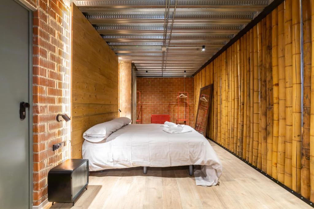 Postel nebo postele na pokoji v ubytování ART LOFTS Valencia by Benisur