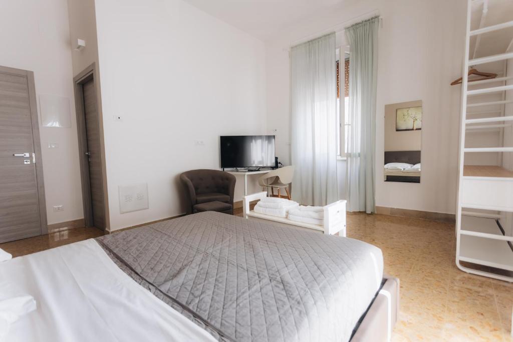 Posteľ alebo postele v izbe v ubytovaní THE NEST - B&B - Suites