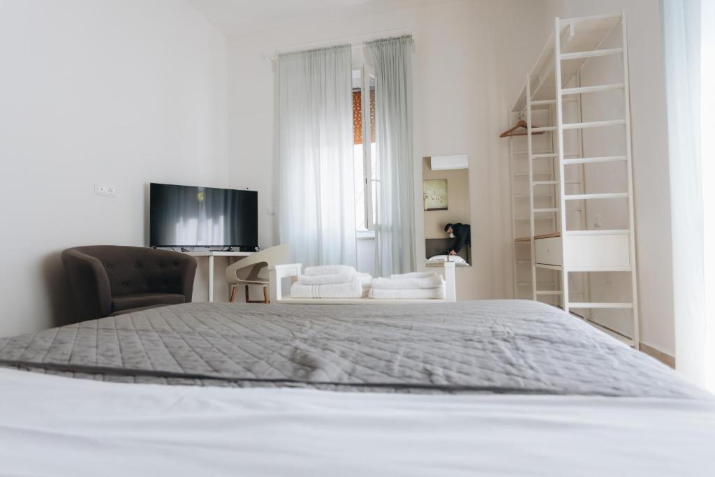Posteľ alebo postele v izbe v ubytovaní THE NEST - B&B - Suites