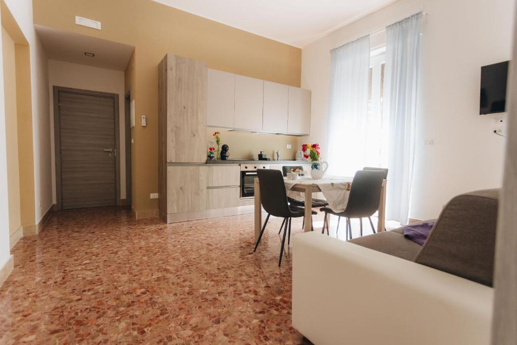 Televízia a/alebo spoločenská miestnosť v ubytovaní THE NEST - B&B - Suites