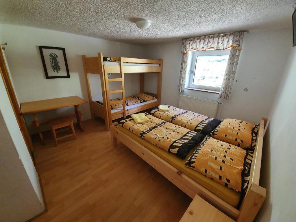 Postel nebo postele na pokoji v ubytování Pr` Florjan