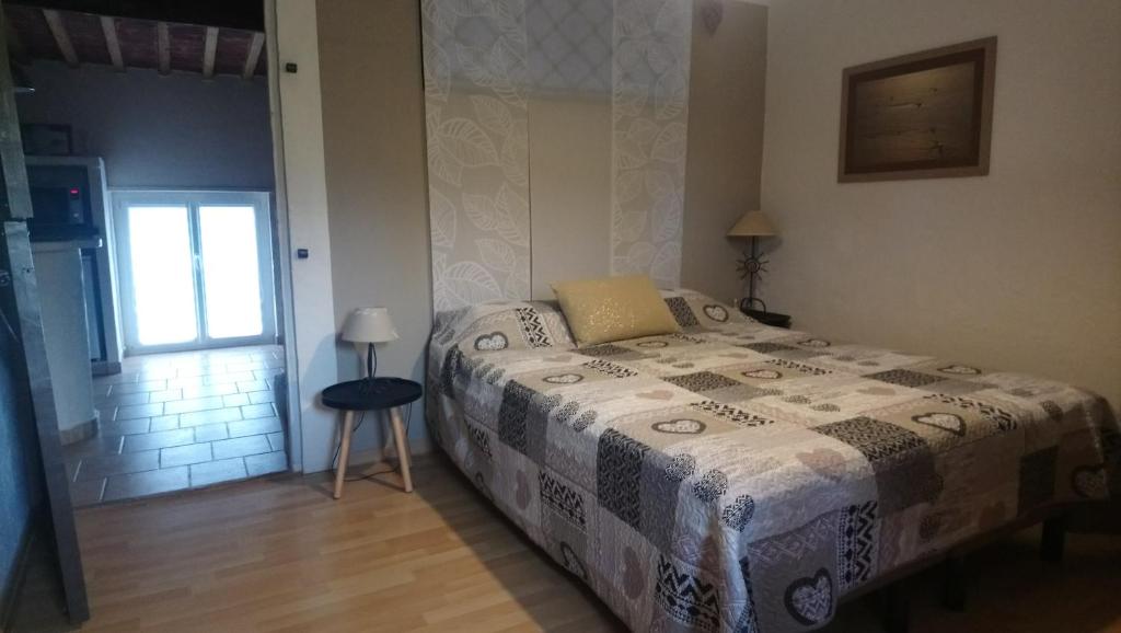 Postel nebo postele na pokoji v ubytování Gîte Mas de la Restanque