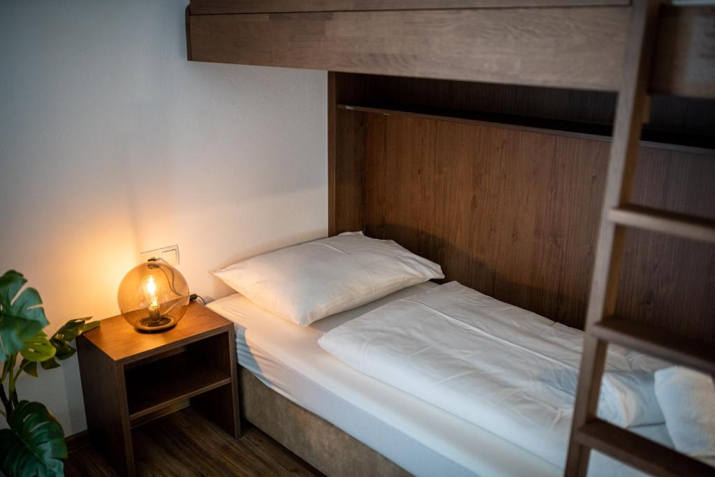 A bed or beds in a room at Amelies Mountain View