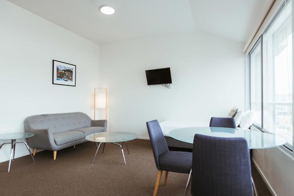 TV a/nebo společenská místnost v ubytování Salamanca Galleria Apartments