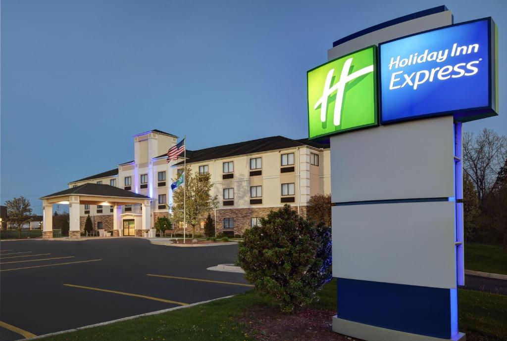 a hilton inn express sign in front of a building at Holiday Inn Express Adrian, an IHG Hotel in Adrian