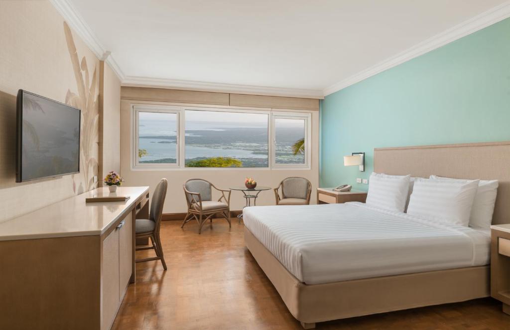 TV a/nebo společenská místnost v ubytování Taal Vista Hotel