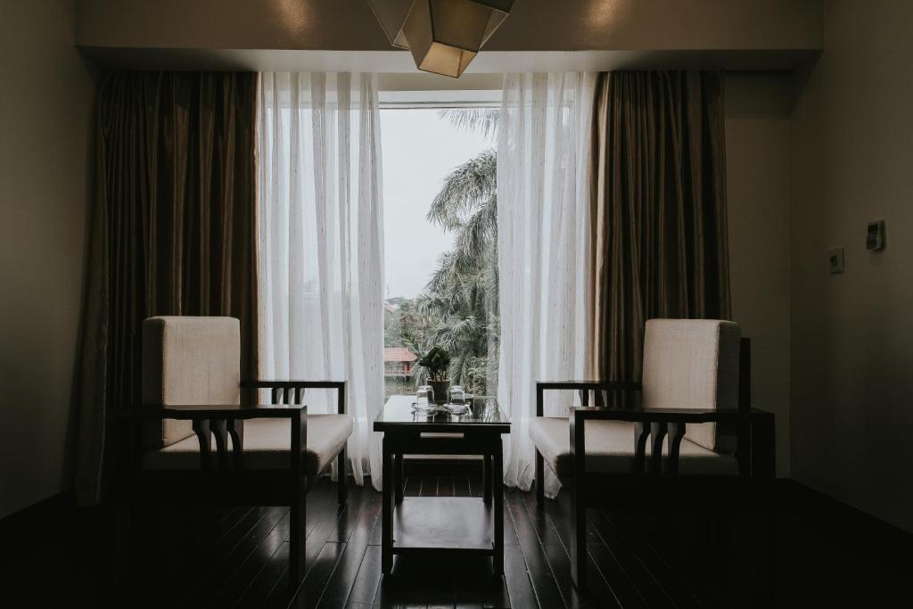 Posezení v ubytování White Palace Thai Binh Hotel