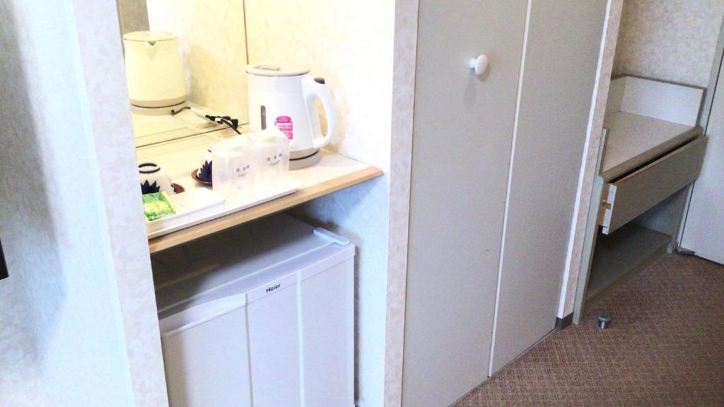 Kuchyň nebo kuchyňský kout v ubytování Toyama Chitetsu Hotel