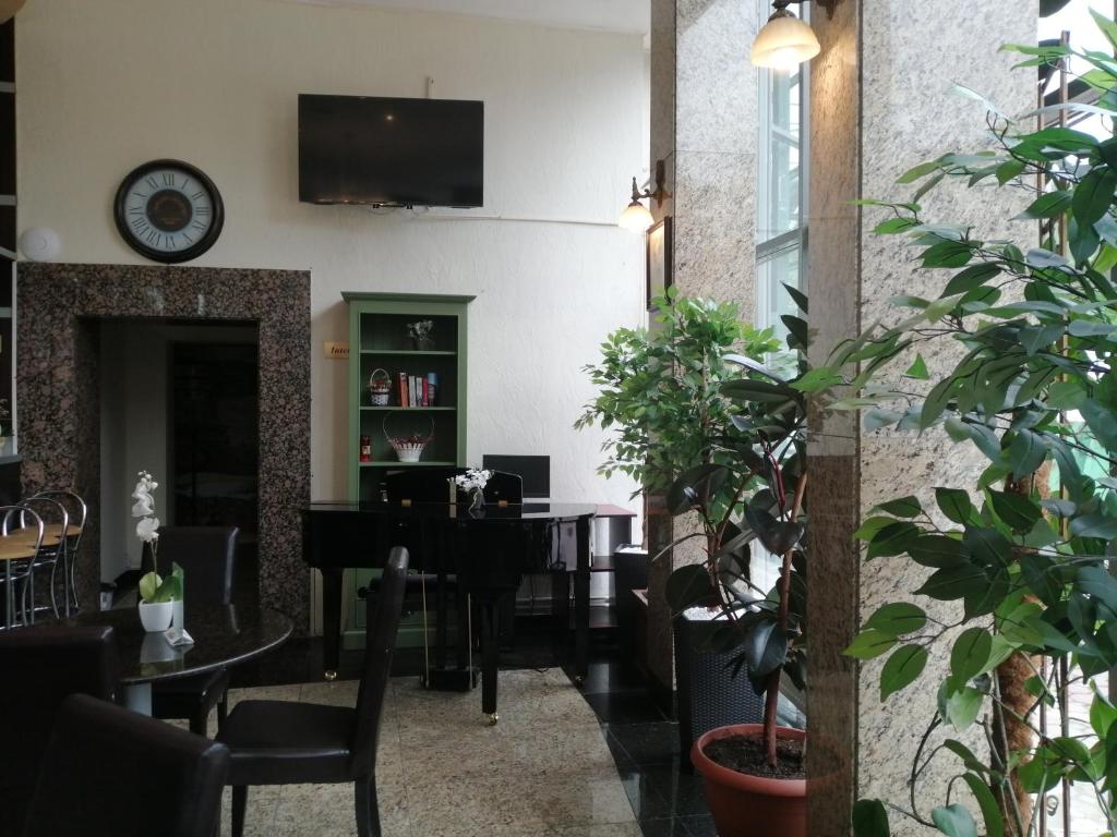 TV a/nebo společenská místnost v ubytování Hotel Piemonte
