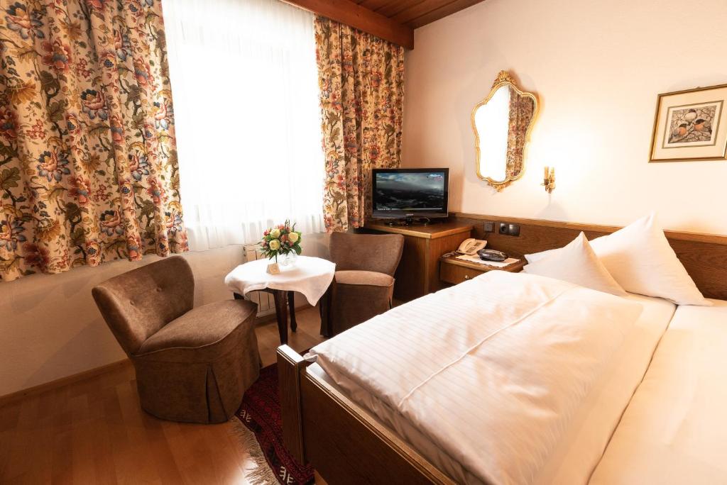 Letto o letti in una camera di Hotel Helga