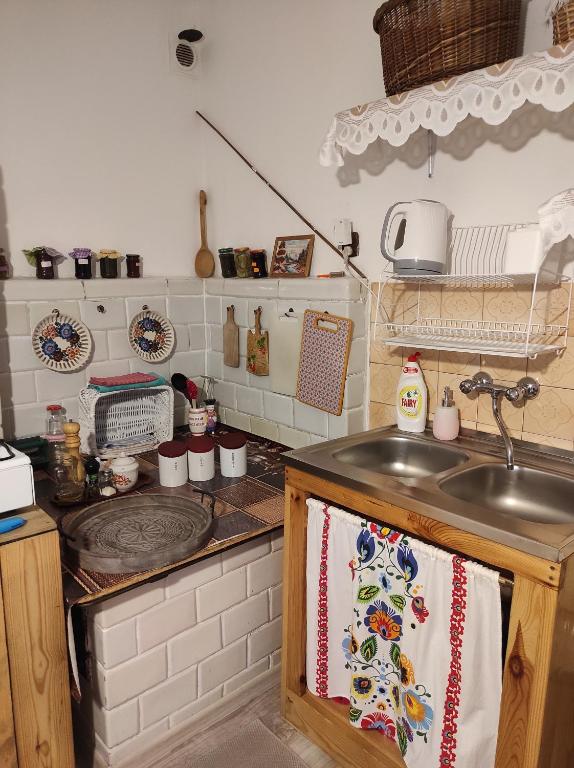 Kuchyň nebo kuchyňský kout v ubytování Agroturystyka Kobylnica nad Wisłą