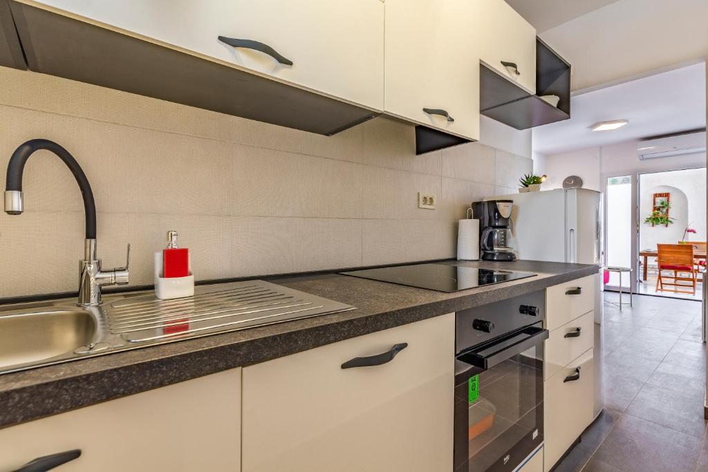 Kuchyňa alebo kuchynka v ubytovaní Apartment Mar