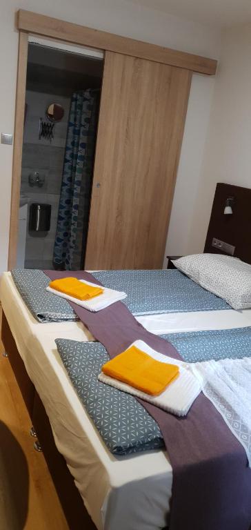 Postel nebo postele na pokoji v ubytování Czermann Holiday Inn