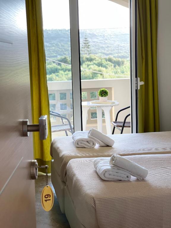 Postel nebo postele na pokoji v ubytování Maria Hotel Sisi